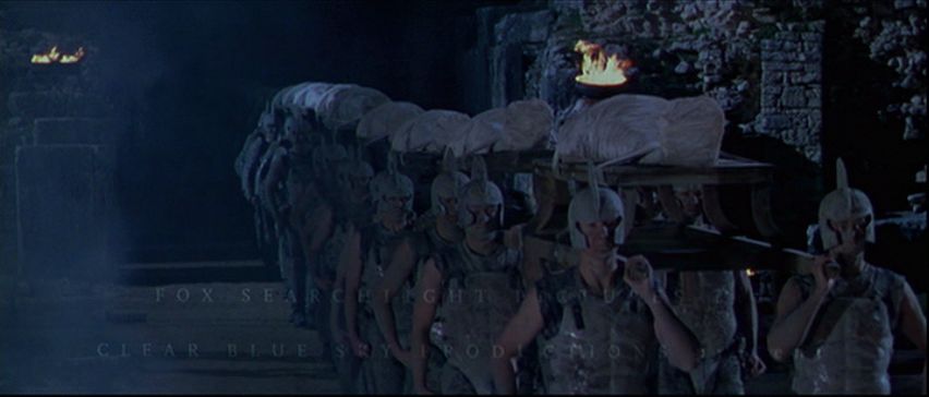 soldiers carrying mummified corpses
